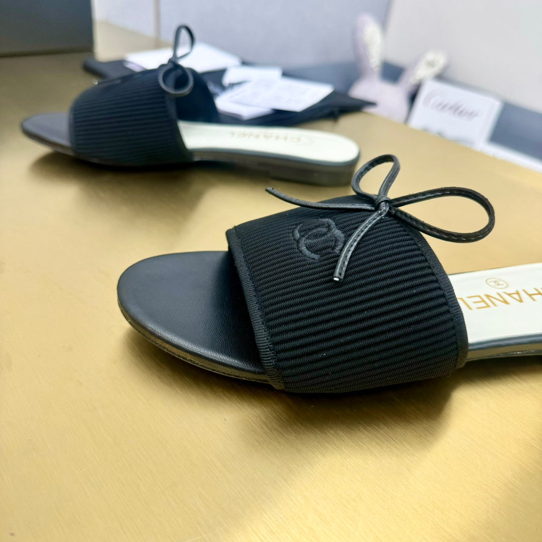 Chanel Bow Slippers in Black Lambskin