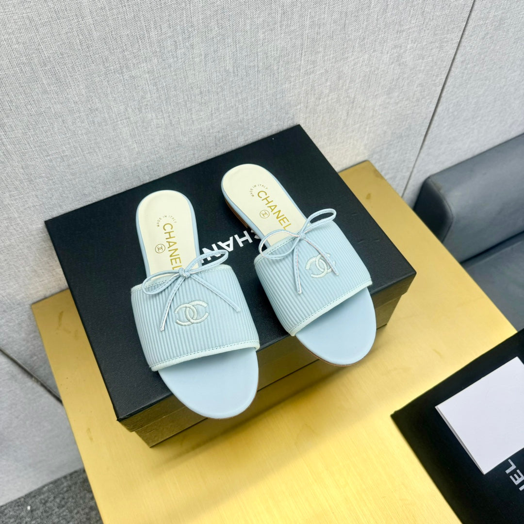 Chanel Bow Slippers in Light Blue Lambskin
