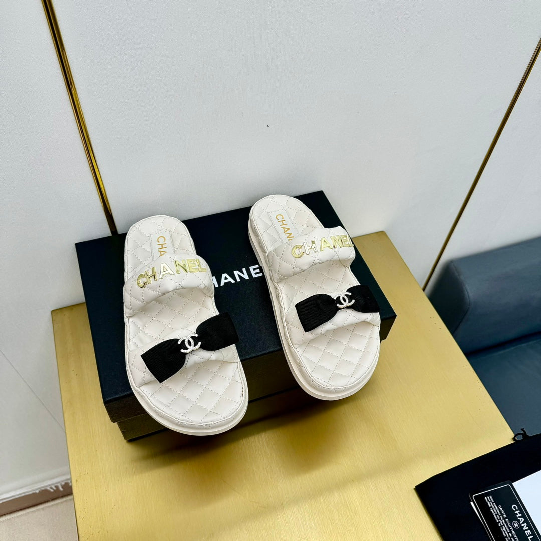 Chanel Dad Sandals with Bow in White Lambskin Mule