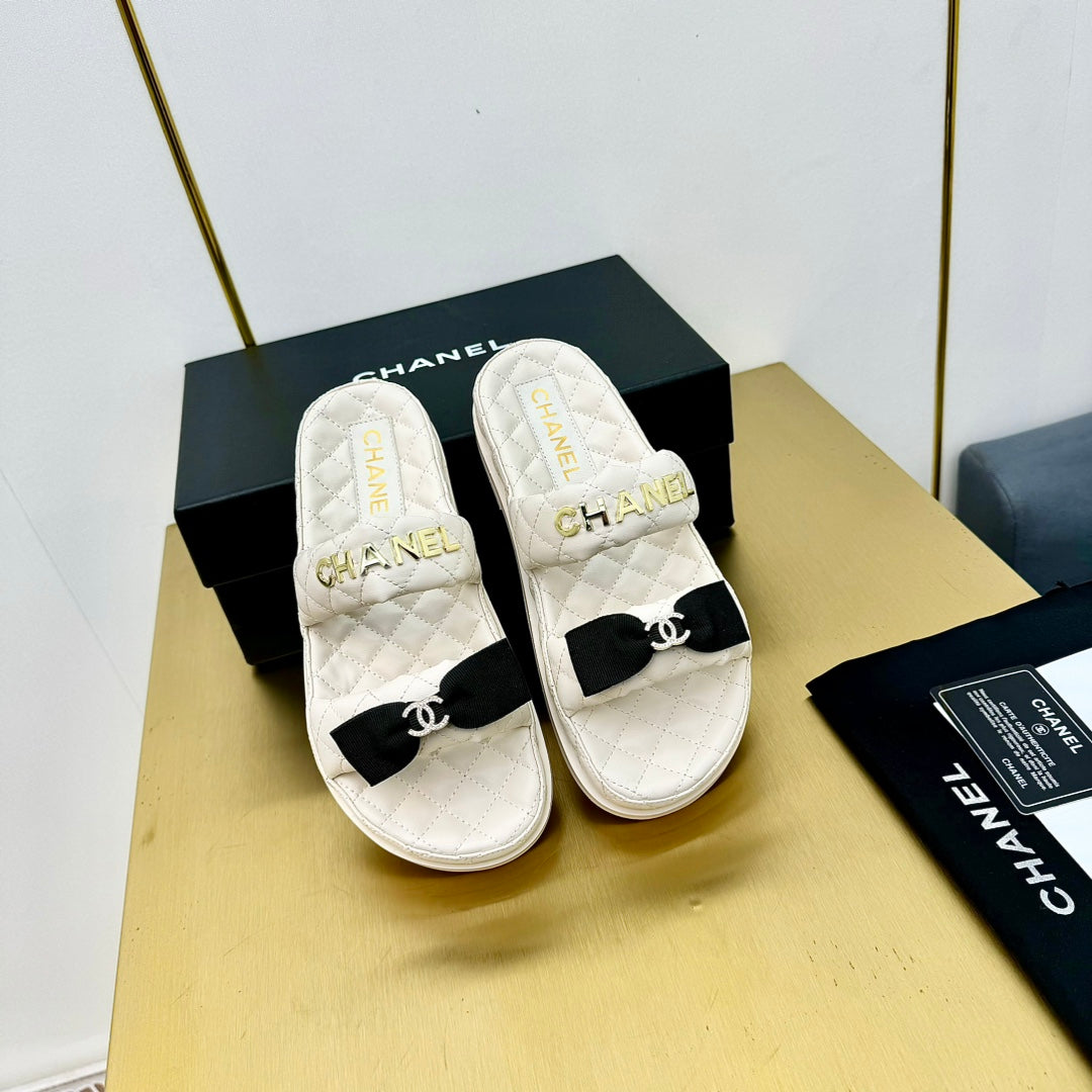 Chanel Dad Sandals with Bow in White Lambskin Mule