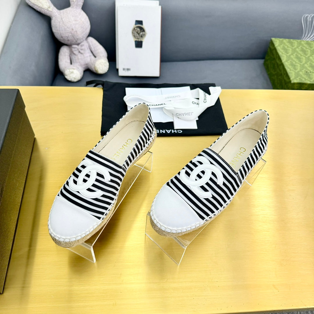 Chanel Slip-On 25S in Black and White Fabric with Striped Pattern