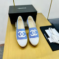 Chanel Slip-On 25S in Blue and White Fabric with Striped Pattern