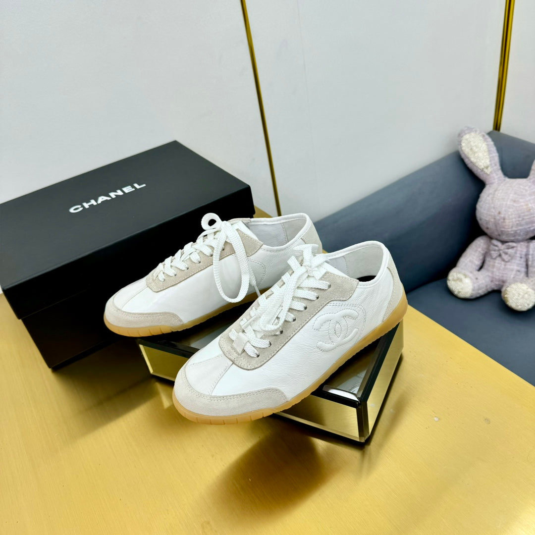 Chanel Sneaker in White Calfskin and Suede
