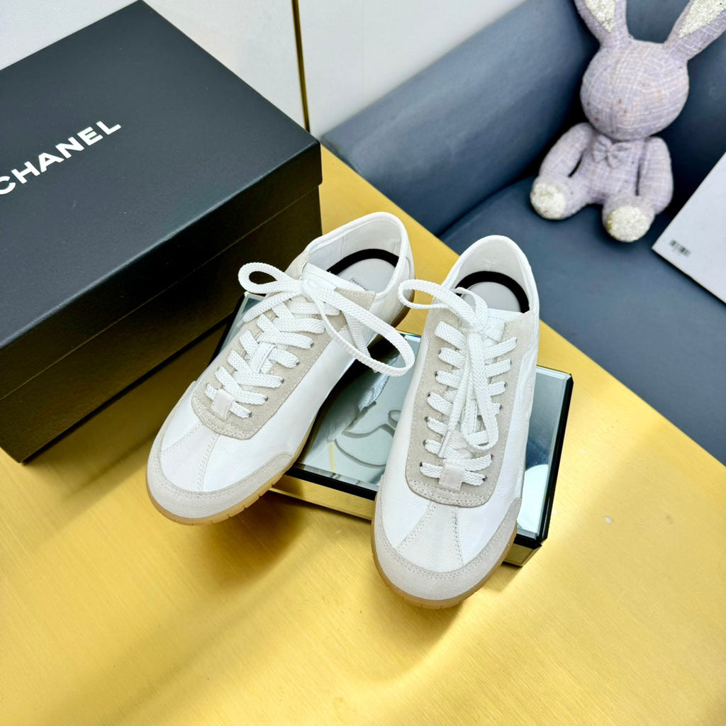 Chanel Sneaker in White Calfskin and Suede