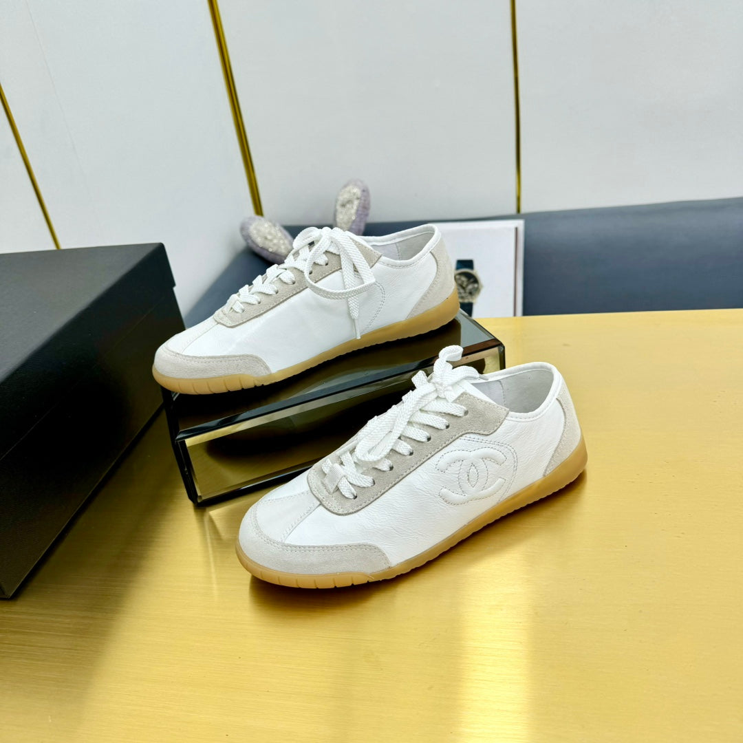 Chanel Sneaker in White Calfskin and Suede