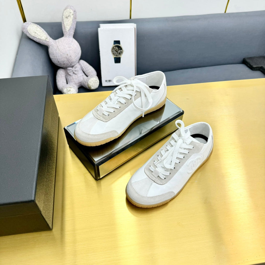 Chanel Sneaker in White Calfskin and Suede