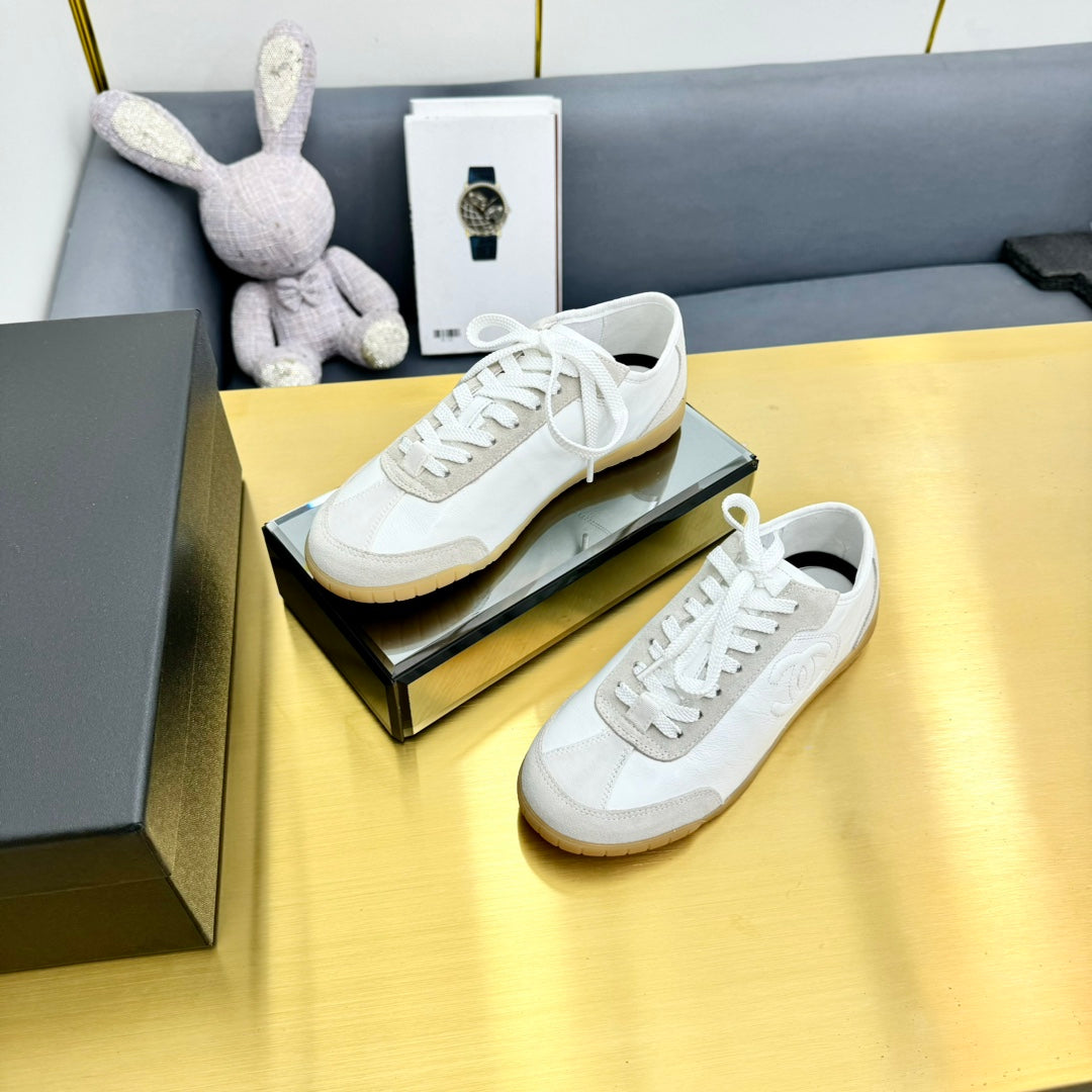 Chanel Sneaker in White Calfskin and Suede