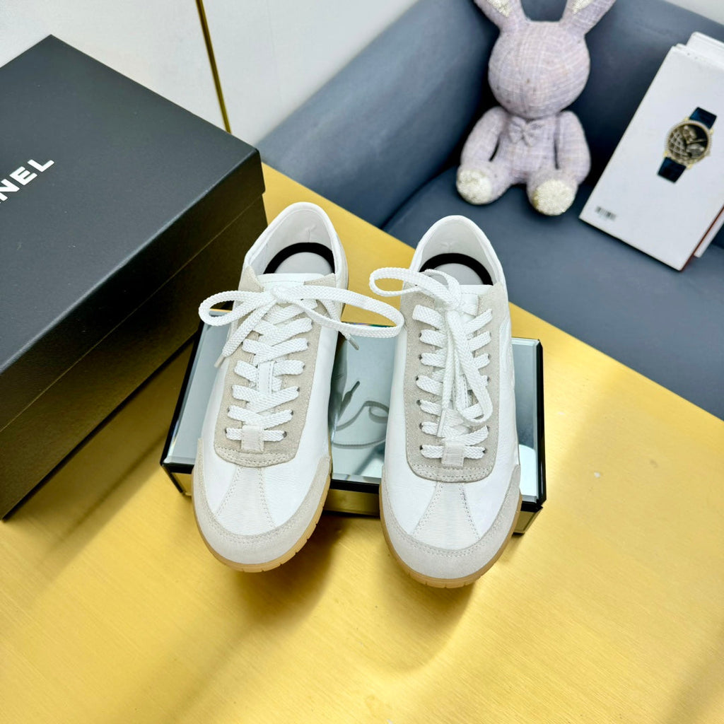 Chanel Sneaker in White Calfskin and Suede