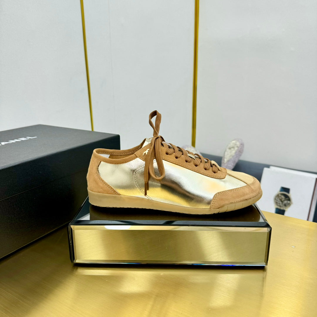 Chanel Sneaker in Gold Calfskin and Suede