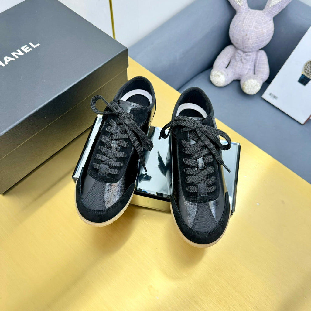 Chanel Sneaker in Black Calfskin and Suede