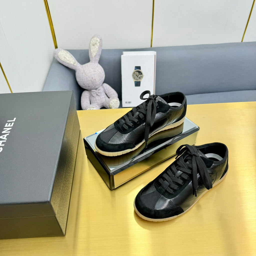 Chanel Sneaker in Black Calfskin and Suede