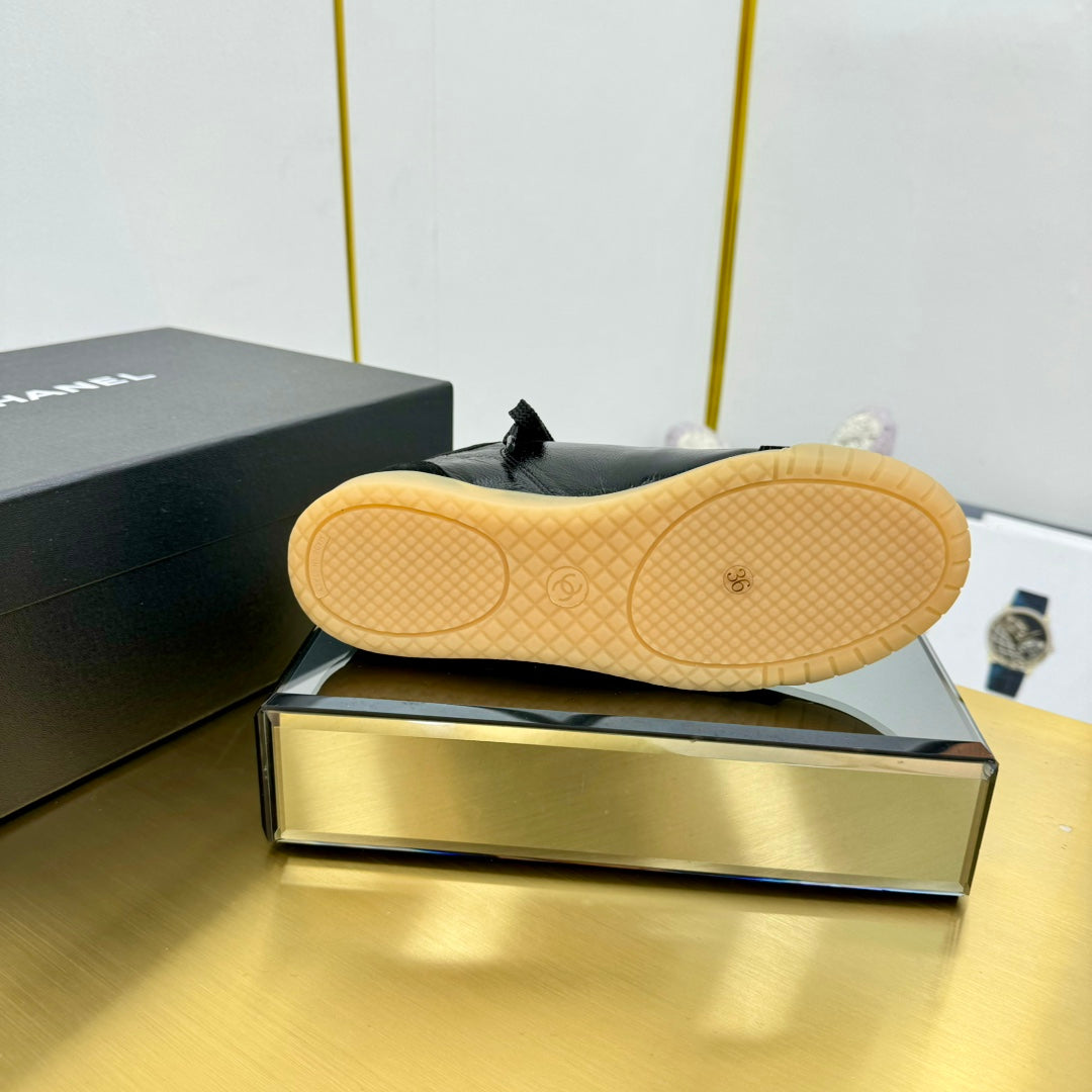 Chanel Sneaker in Black Calfskin and Suede
