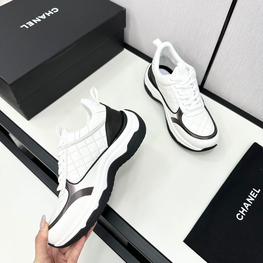 Chanel Sneaker in White Mix Black Embroidered Lambskin