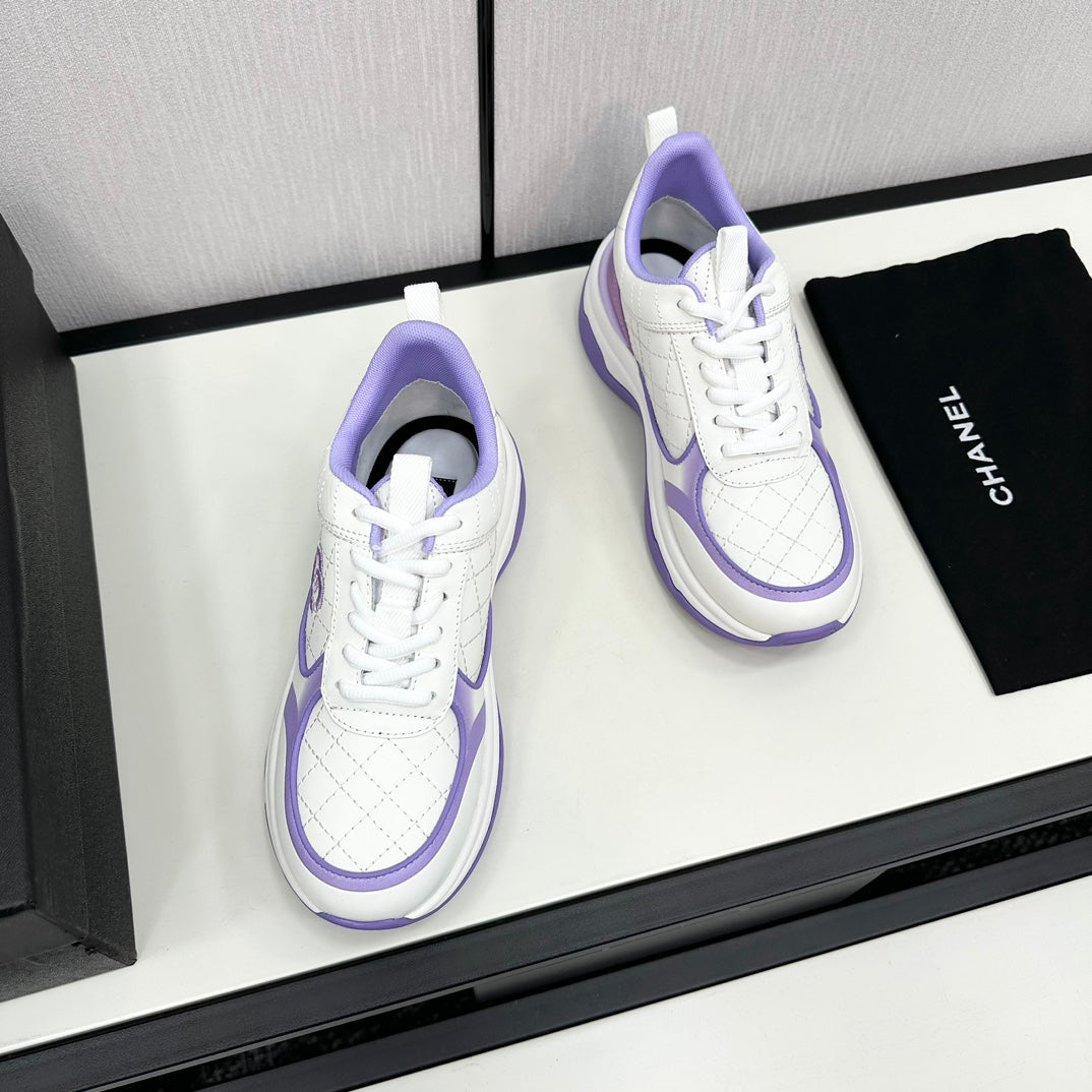 Chanel Sneaker in White Mix Iris Purple Embroidered Lambskin