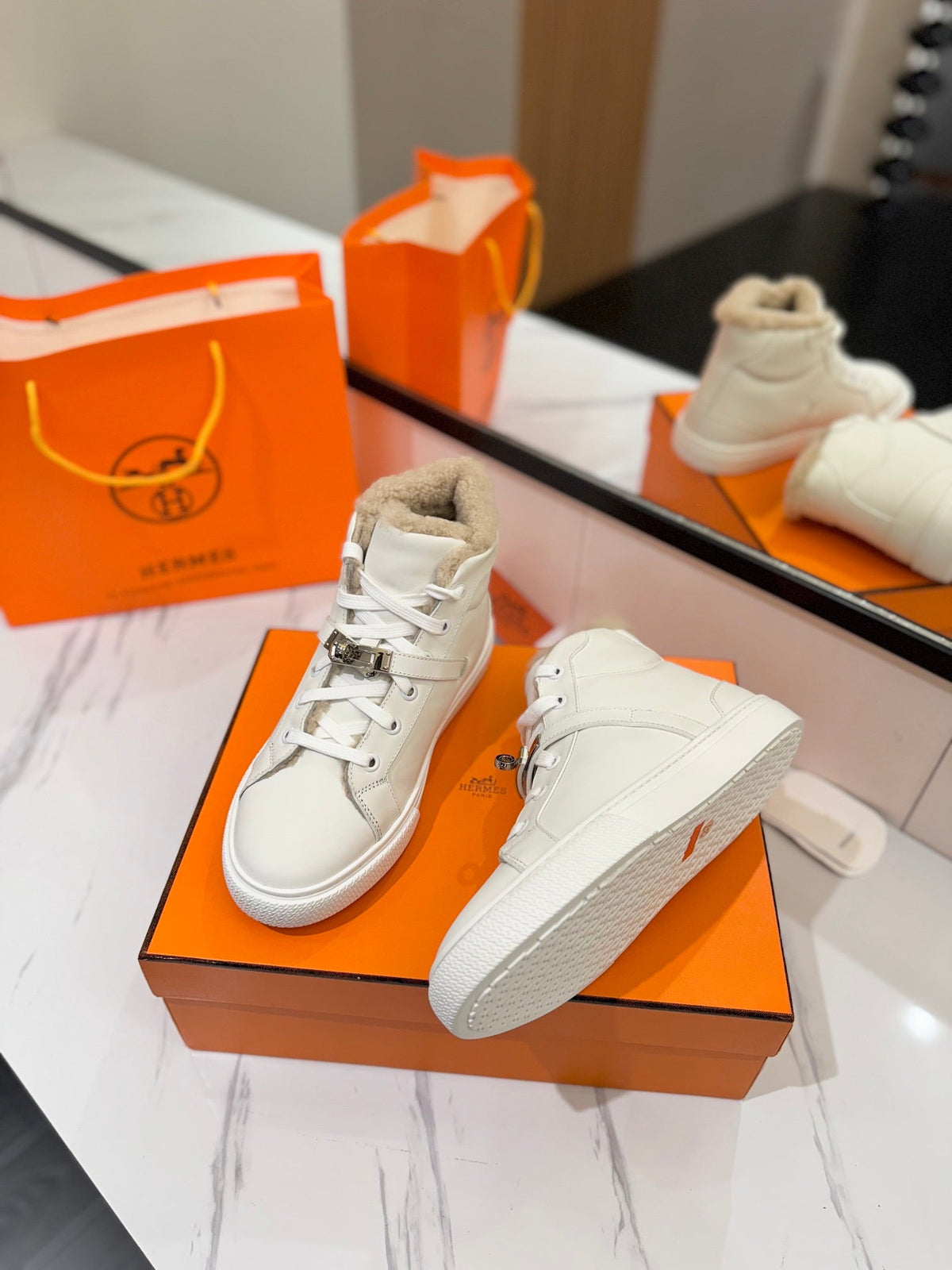 Hermes Chealsea Boots in White Calfskin and Fleece Lining